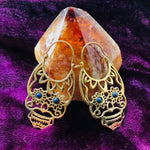 Load image into Gallery viewer, Brass Sugar Skull Hoops with Gemstone Eyes

